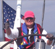 Skipper Walker at the Helm of the Grey Goose